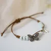 Bracelets de charme étoile de papillon tissée à la main avec perle en céramique chaîne de poignet réglable bijoux cadeau pour femme fille