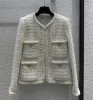 Top de temperamento de estilo suave para mujer, abrigo corto de punto con cuentas de fragancia pequeña Beige, cuello redondo, novedad de invierno 2024