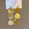 Charm Metal Ginkgo Leaf Tassel örhängen för kvinnor Europeiska och amerikanska överdrivna dingle örhängen Premium bröllop smycken gåva y240328