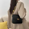 12% OFF Sac de designer 2024 Sacs à main coréen personnalisé mode aisselles printemps style occidental élégant cent style enchaîné une épaule bandoulière