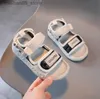 Sandaler 2024 Girls Summer Shoes Boys Beach Sandaler Baby Cork Shoes Childrens läder Sandaler Ny mode Casual Childrens Shoes Q240328