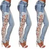 Jeans svasati elasticizzati a vita media Scava fuori applicazioni di pizzo Fi Jeans Pantaloni floreali a matita da donna i8um #