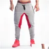 Calças masculinas Mens Bodybuilding Gym Workout Jogger Esporte Atlético Slim Fit Sweatpants Homens Chandal Hombre Wear Animal Drop Delivery Appa Dh9az