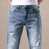 OUSSYUU MARK MĘŻCZYZN Dżinsy Slim Fit chude jeansowe dżinsy designerskie elastyczne spodnie dziurki niebieskie spodni dla mężczyzn 28-40 f063#