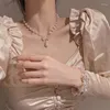 Baumelnde Ohrringe, die Modeschmuck-Set verkaufen, elegante weiße Perlenkette, sexy weibliche Schleife, Abschlussball-Party-Armband