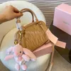 Avonddraagtas Designer schoudertas voor dames Luxe geplooide handtas Crossbodytas onder de oksel Ritssluiting Zacht leer Vakantietassen Geplooide schelptas