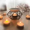 Portacandele Creativo geometrico scavato Cremagliera Romantica arte del ferro Candeliere a olio essenziale Porta tealight Stufa