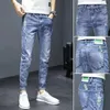 Jeans da uomo Pantaloni da cowboy maschili Skinny da uomo Pantaloni strappati elasticizzati Tubo stretto rotto Vestibilità slim con fori Elastico strappato Moda coreana