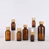 Lagringsflaskor tom 5 ml 10 ml 15 ml 20 ml 30 ml 50 ml 100 ml 1 oz Essential Oil Cosmetic Serum Amber Glass Bottle With Bambu Droper Top