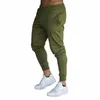 primavera nuovi pantaloni con cintura pantaloni sportivi pantaloni di chiusura a libro casual allentati di colore solido da uomo S-3XL L3xo #