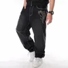 Calças de brim masculinas homem solto baggy hiphop skate calças jeans rua dança hip hop rap masculino calças pretas tamanho chinês 30-46