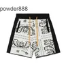 Schwarz-weiße kontrastierende Cashew-Blumen-Strickpullover-Shorts, lockere High-Street-Modemarke Rhude, lässige Capris für Männer und Frauen