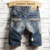 2024 Été Nouveaux hommes Denim Shorts Vintage Ripped Jeans courts Streetwear Hole Male Marque Vêtements S89q #