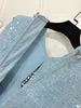 Spring New Women's Fashion French French Celebrity Small Fragrant Round Neck Sequin Hollow Out Sans manches robe courte