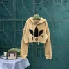 Kadın Hoodies Sweatshirts Tasarımcı Kadınların kapüşonlu kapüşonlu moda ön -düşkları gelgit gelgit baskısı çatışma rengi kısa mahsul pamuk uzun kollu kadın