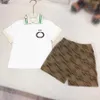 Brand Boys Polo Shirt Set Designer Ubrania Letnie dresy dla niemowląt Rozmiar 100-150 cm kołnierz klapy krótkie rękawy i spodenki 24MAR