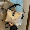 Fabrieksbron Handtassen van hoge kwaliteit is zomertas 2024 Nieuwe trendy en modieuze canvas crossbody Hoogwaardig gevoel Handemmer