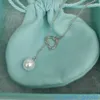 Original 1to1 högkvalitativ märkesdesigner halsband Tiffancy S925 Sterling Silver Pendant Womens Simple Tassel Love Pearl Necklace med riktig logotyp