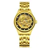 ForSing/Fuxini Kvinnors helautomatiska mekaniska Phoenix Vermilion Bird Gold Hollow Watch 8222