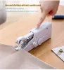 Máquinas Mini máquina de coser portátil Ropa de mano inalámbrica Ropa de bricolaje Tela Máquina de coser eléctrica Accesorios de herramientas manuales
