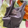 MUI MUI T Shirt Women's Thirt Designer Tee Summer MiUi Nail Bead رسالة ثقيلة الصناعة الضيقة الضيقة سترة التخسيس الجديدة السفلية أعلى MUI 4613