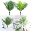 Decoratieve bloemen gesimuleerde planten kunstmatige palmboomdecor voor huizen tuinkantoor plastic nepbladeren