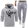 Mens Tracksuit Tech Set Designer Track Terno Europa American Basquete Futebol Rugby Duas Peças Com Mulheres Manga Longa Jaqueta Com Capuz Calças Primavera Outono S-3XL