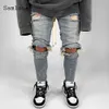 Jeans skinny da uomo Pantaloni in denim strappati con foro sexy Streetwear Fi 2023 Pantaloni con coulisse Pantal in stile europeo e americano x9yq #