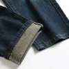 Pantaloni in denim chiaro rovinato Pantaloni coreani da uomo Jeans strappati da uomo Ruffian Handsome Large Size 56P7 #