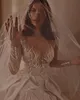 Designer-A-Linie-Hochzeitskleid für Damen, transparenter Ausschnitt, ärmellose Brautkleider, Pailletten-Applikationen, Sweep-Zug-Kleid nach Maß
