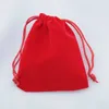 ジュエリーポーチ50pcs/lot赤のベルベットバッグ7x9cm小さなポーチバッグ好意チャームパッケージかわいい結婚式のドローストリングギフト