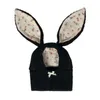 Vêtements pour chiens Chapeau pour animaux de compagnie Motif de fleurs Oreilles adorables tricotées Confortables Chapeaux d'hiver chauds pour chat pour temps froid