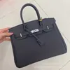 Ein Birknns Classic Bag Hang Tag kleines Schloss Litschee Getreide Kuhlatten -echtes Leder für Frauen Handheld Crossbody Single Schulter Silber Schnalle Klassiker Klassiker