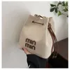 Magasins Export Designer Sacs à bandoulière Sac de grande capacité pour femmes 2024 Nouvelle toile à la mode Seau contrasté Simple et décontracté One Crossbody