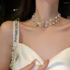 Baumelnde Ohrringe, die Modeschmuck-Set verkaufen, elegante weiße Perlenkette, sexy weibliche Schleife, Abschlussball-Party-Armband