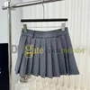 Fashion Designer Shorts Skirts for Women Summer Pleated A Line Dress Metal Letter Mini Skirts Classic Irregular Sexy Dress