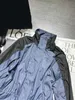 女性用ジャケットデザイナーブランド2024早春に新しいナニュープラプラシンプルでカジュアルな気質、ファッショナブルなカラーブロッキングベルト、ウエストアップスタンドカラー、アサルトスーツFCAX
