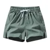 Herenshorts Heren Activewear Elastisch Trekkoord Taille Sport met ritszakken Effen kleur Ijszijde Strand voor de zomer