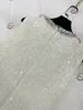 Spring New Women's Fashion French French Celebrity Small Fragrant Round Neck Sequin Hollow Out Sans manches robe courte