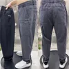 Ny vårens höstkoreanska baggy sex fickor hip-hop-dragkammare mäns lyx denim arbete slitage casu casual jogger haren jeans byxor p79c#