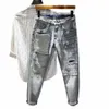 Mäns jeans koreanska versi trendiga lapptäcke med ctrasting färghål smala passande små benbyxor rippade män jeans 179c#
