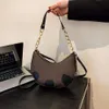 Die Fabrik liefert dieses Jahr direkt Umhängetaschen und eine Unterarmtasche für Damen 2024, modische, vielseitige Einzel-Crossbody-Crossescent