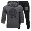 Nieuwe heren designer trainingspak sweatshirt joggingbroek tweedelige high street heren dames hoodie en joggingbroek tech fleece trainingspakken.