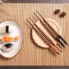 Chopsticks Creative Japanese and Style Wood med trassliga trådar Bokspetsade rött sandelträ