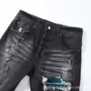 2023 Ранняя осень Новая мужская серия износа Смешанные микроэластичные отверстия Пластырь плотные джинсы.