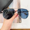 Okulary przeciwsłoneczne Najwyższej klasy modny tytanowy podwójny most pilotek Styl Mężczyźni Kobiety Mode