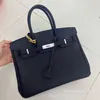 Ein Birknns Classic Bag Hang Tag kleines Schloss Litschee Getreide Kuhlatten -echtes Leder für Frauen Handheld Crossbody Single Schulter Silber Schnalle Klassiker Klassiker