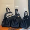 Lychee Schnalle Schicht Leder Schulter Berkins Taschen Cowide Designer Muster Togo 2024 Mode eine Tasche tragbare Frauen Frauen Silber Klassiker Gold Hardware QX9J Y7L1