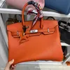 Ein Birknns Classic Bag Hang Tag kleines Schloss Litschee Getreide Kuhlatten -echtes Leder für Frauen Handheld Crossbody Single Schulter Silber Schnalle Klassiker Klassiker