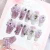 Faux ongles en forme de coeur strass violet long luxueux rougi artificiel pour la décoration de manucure d'art d'ongle